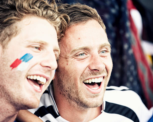 istock Sports fans cheering a game 472028949