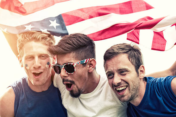 istock Sports fans cheering a game 472029281