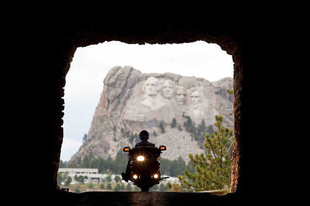 View of Mount Rushmore through tunnel in Custer State Park, South Dakota.