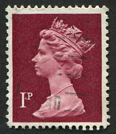 Gomel, Belarus - March 23, 2013: Postage stamp. A stamp printed in UK shows image of Elizabeth II is the constitutional monarch of 16 sovereign states known as the Commonwealth realms, head of the 54-member Commonwealth of Nations, in brown, circa 1996.