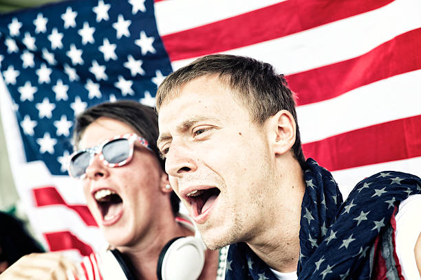 istock Sports fans cheering a game 472031353