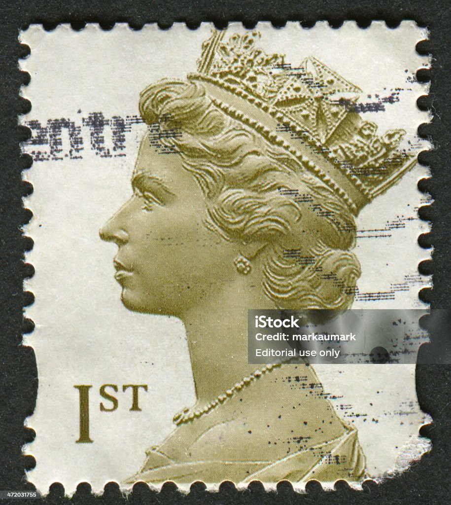 Postage stamp. Gomel, Belarus - May 2, 2013: Postage stamp. A stamp printed in UK shows image of Elizabeth II is the constitutional monarch of 16 sovereign states known as the Commonwealth realms, in Olive-Brown , circa 2000. 21st Century Stock Photo