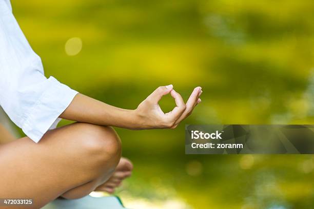 Meditating Stock Photo - Download Image Now - Adult, Adults Only, Alternative Lifestyle