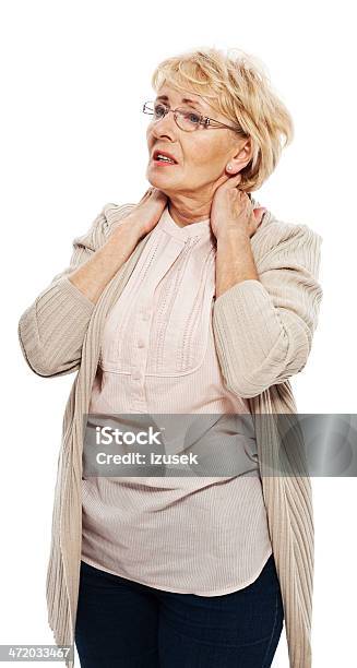 Neck Pain Stock Photo - Download Image Now - Backache, Senior Women, White Background