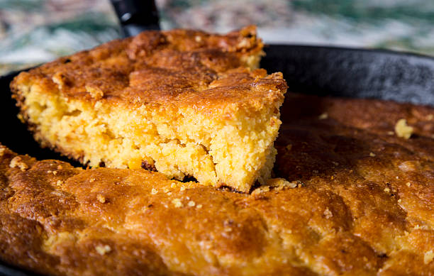 Serving Corn Bread in Cast-Iron Pan stock photo