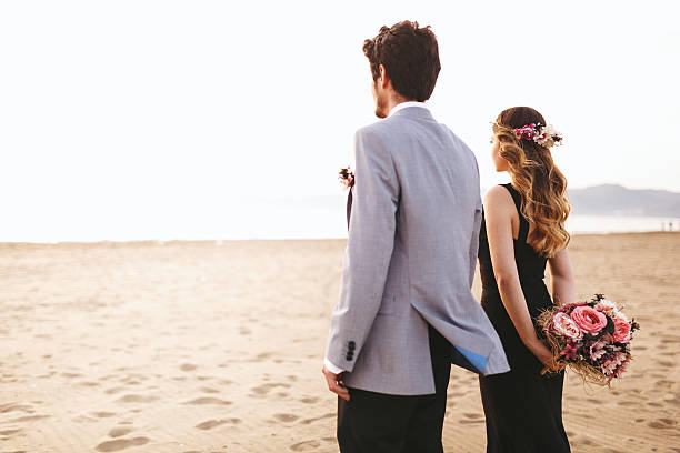 istock Loving couple on beach 472036034