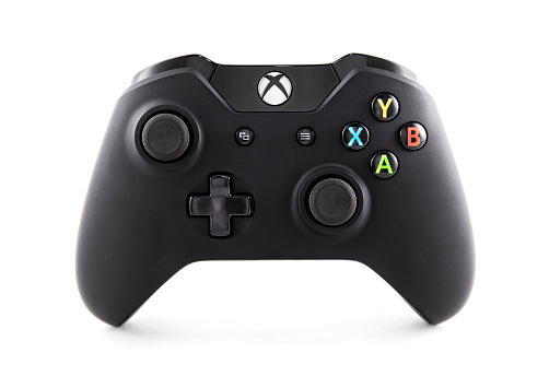 Nashville, Tennessee, USA - November, 25h 2013: A photograph of the new Xbox One video game console controller, sold by Microsoft. Shot against a white background in Nashville TN.
