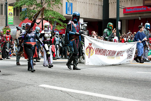 Atlanta, GA, USA - August 31, 2013:  Mandalorian mercenaries from the Star Wars movies walk down Peachtree Street in the annual Dragon Con parade.