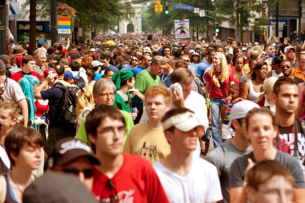 Thousands Of Spectators Fill Street After Atlanta Dragon Con Parade Atlanta, GA, USA - August 31, 2013:  Thousands of spectators fill Peachtree Street following the annual Dragon Con parade. Phobia stock pictures, royalty-free photos & images