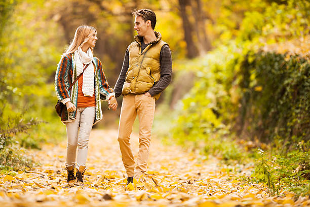 istock Couple walking in the park. 472036949