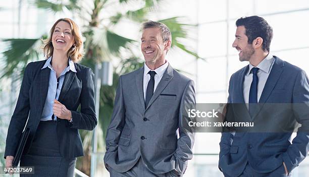 Positive Business Personen Stockfoto und mehr Bilder von 50-54 Jahre - 50-54 Jahre, Arbeitskollege, Arbeitsstätten
