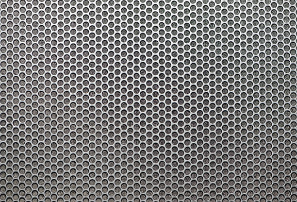 istock Sheet of metal covered circular holes 472038071