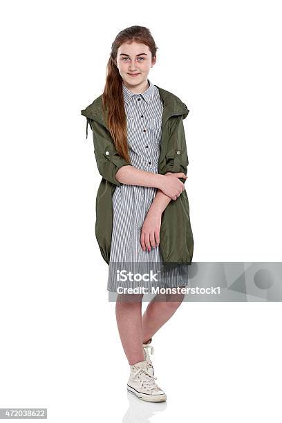 Cute Young Girl Looking At Camera Stock Photo - Download Image Now - Girls, Teenage Girls, 12-13 Years