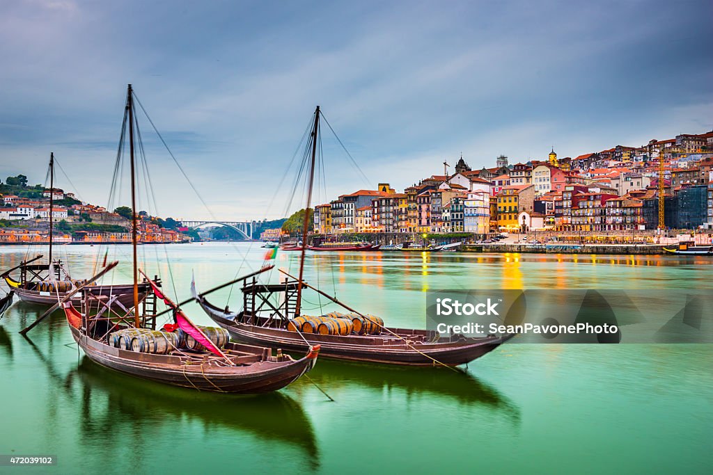 Beautiful depiction of boats at Porto Portugal Porto, Portugal old town cityscape on the Douro River with traditional Rabelo boats. Portugal Stock Photo