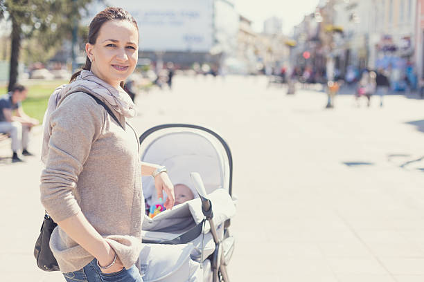 istock Walking in the city with a baby 472039182