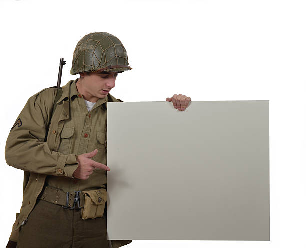 istock young American soldier shows a sign 472039471