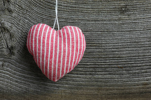 istock Merry Christmas Decoration Red Stripes Fabric Heart 472040033