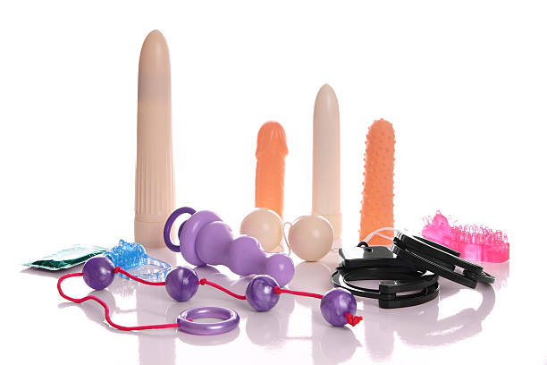 sex toys large collection of sex toys phallus shaped stock pictures, royalty-free photos & images