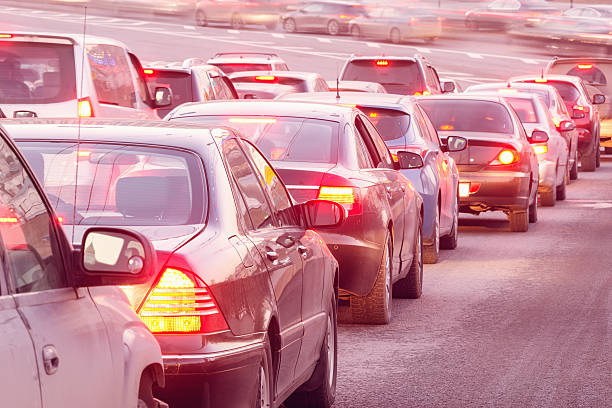 istock Cars stand before the trafficlight. 472042164