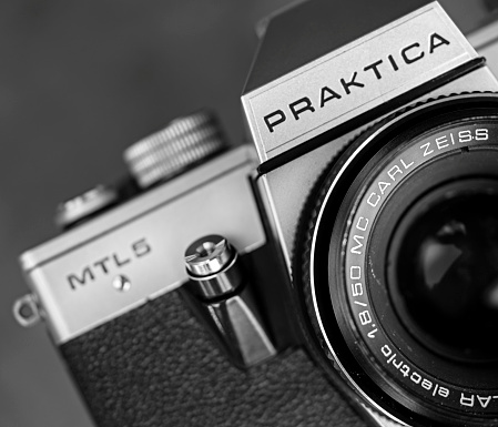 Antalya, Turkey - November 1, 2013: Product shot of a Praktica MTL5 analog SLR camera with 50mm Carl Zeiss lens attached