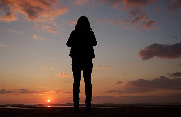 Woman watching the sunset