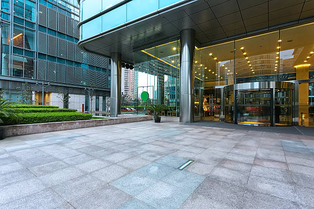 istock Empty road in front of building entrance 472044830