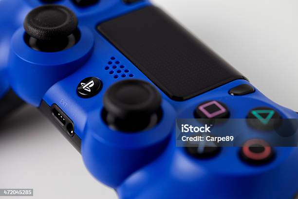 Blue Joypad For Play Station 4 Stock Photo - Download Image Now - Number 4, Playstation, 2013