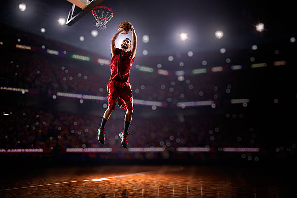 istock red Basketball player in action 472045512