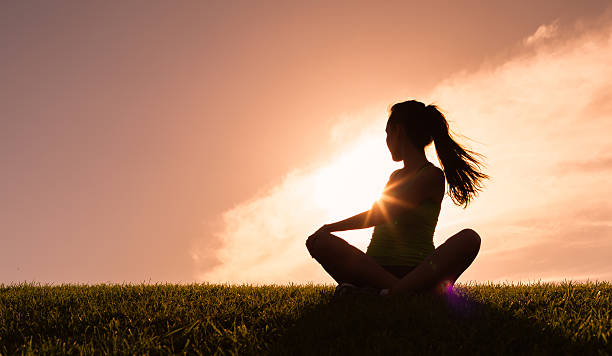 istock Woman doing yoga 472046030