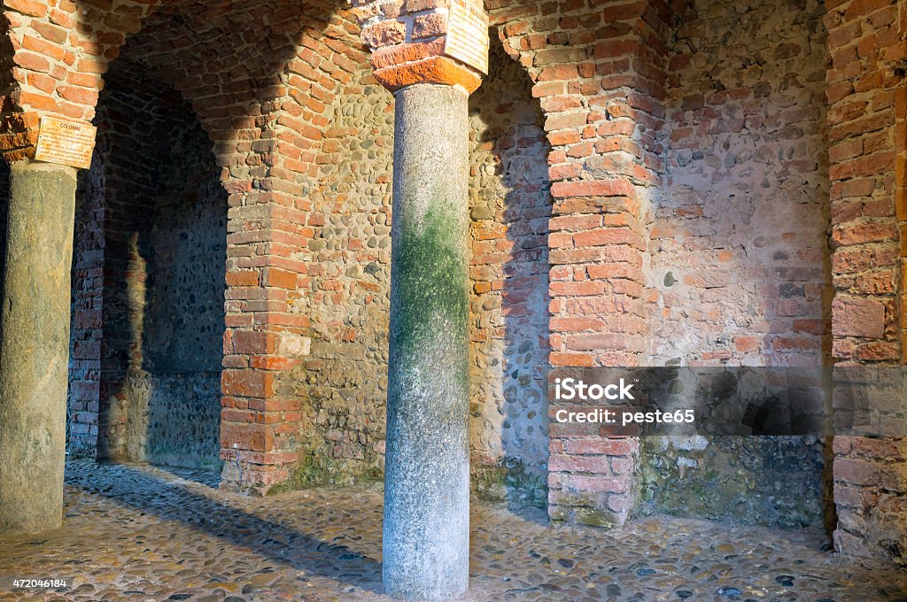Ancient medieval church. Color image Internal view of a monastery church, with marble columns, dating back to the X century A.C., in Romanic style (Lomellina, Northern Italy). 2015 Stock Photo