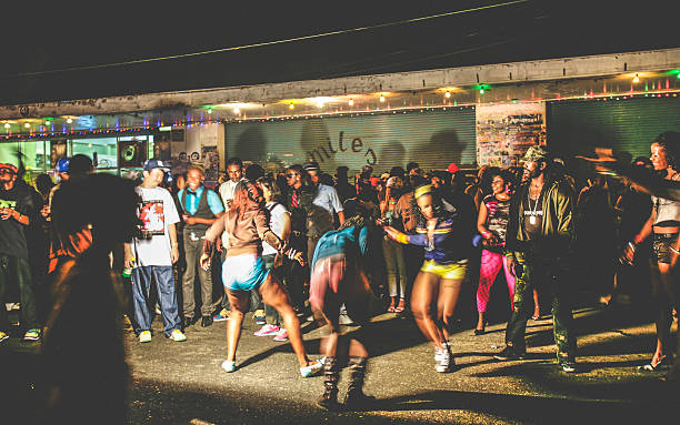 Kingston, Jamaica - June 26, 2008: Crowd enjoying reggae/dancehall music and dancing at ghetto street party, called \