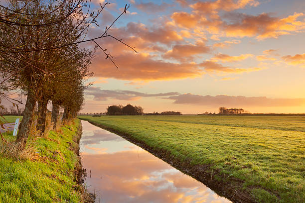 istock Rural landscape in The Netherlands at sunrise 472047181
