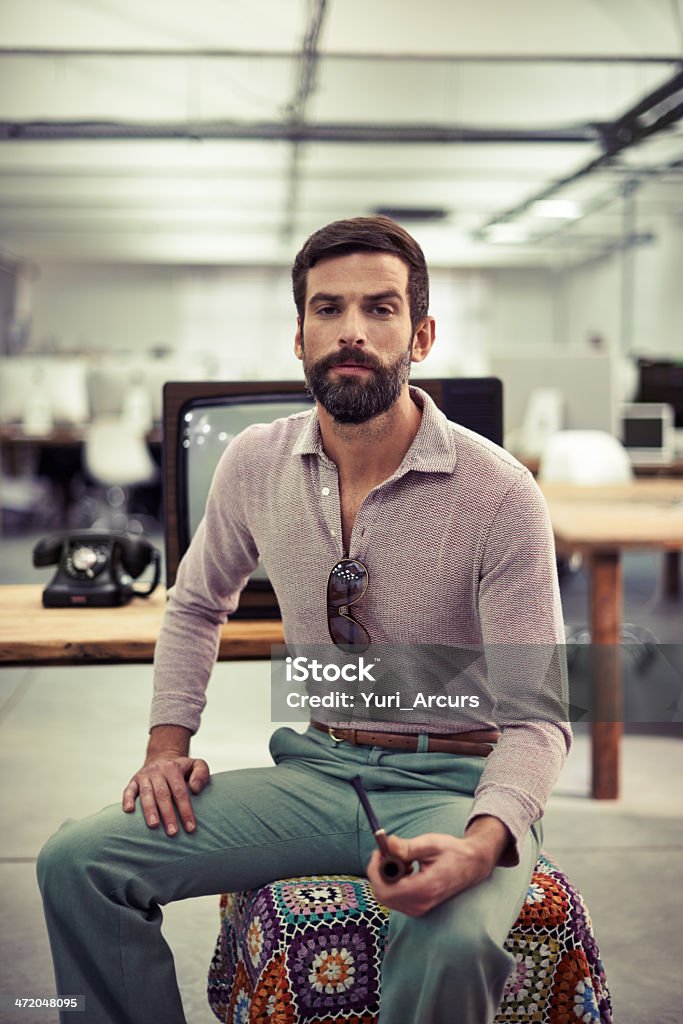 I take my work seriously! A confident creative businessman from the 70s sitting in his officehttp://195.154.178.81/DATA/i_collage/pi/shoots/782691.jpg Hippie Stock Photo