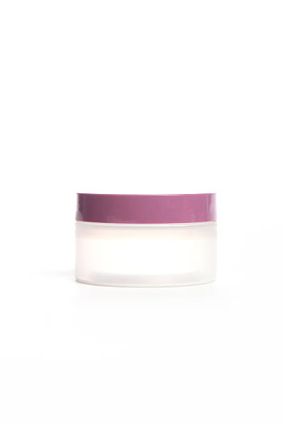 istock Cosmetic can with purple lid 472048343