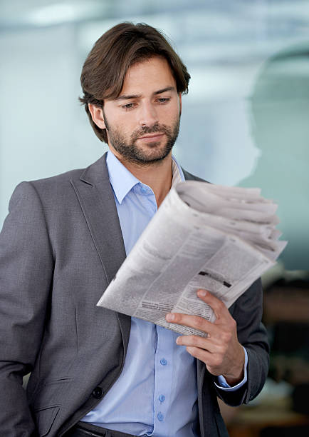 istock Hoping to find his share prices are up... 472049099