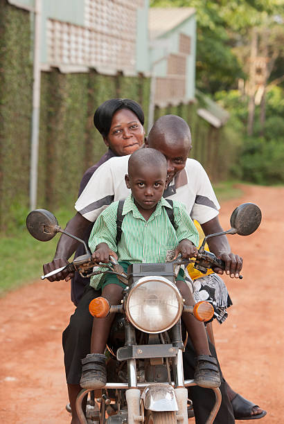 Close up of a little boy's hand holding a bicycle handlebar. Child playing with bicycle