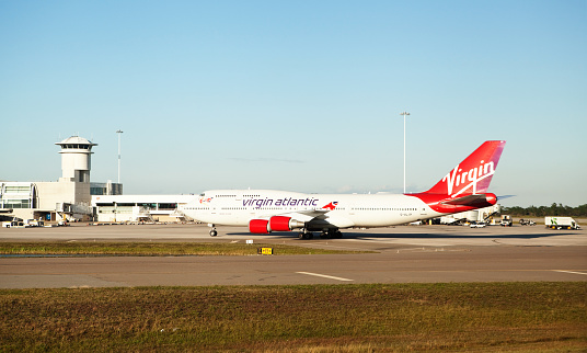 Orlando, Florida, USA - December 2, 2013: A Virgin Atlantic Boeing 747-400 airplane, registered as G-VLIP and named 