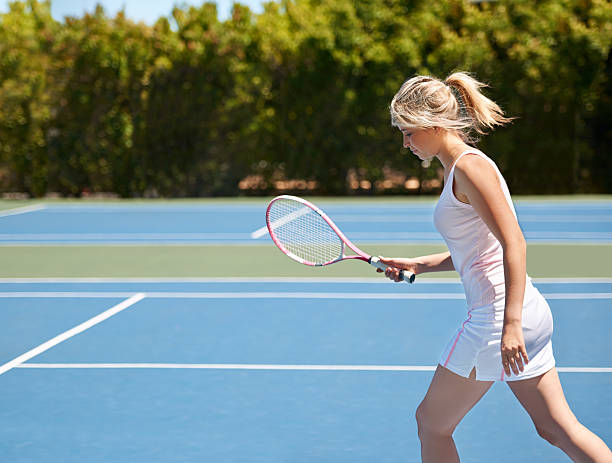 istock Working hard on the court 472052335