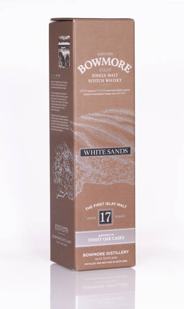 Bowmore white sands Bayreuth, Germany – April 26, 2015: presentation box of a 17 years old Scottish single malt whisky from the distillery Bowmore, situated on the isle Islay.  bowmore whisky stock pictures, royalty-free photos & images