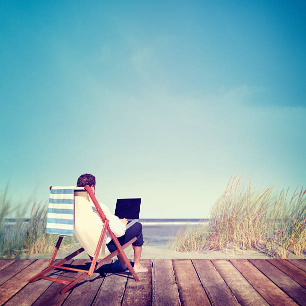 istock Businessman Working Summer Beach Relaxation Concept 472054082