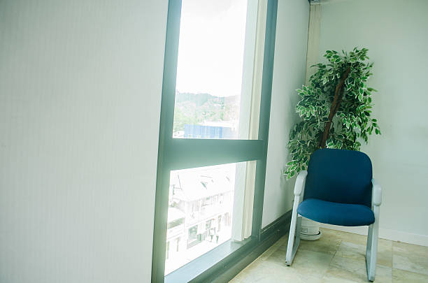 istock single chair in office waiting area 472054212