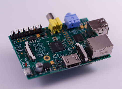 Haarlem, Netherlands - December 4, 2013: Raspberry Pi - Model B. With colored connectors is made in the UK