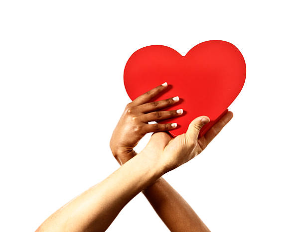 istock Two hands trying to take possession of red heart: Rivalry! 472054839