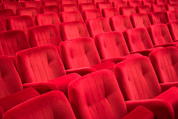 istock Red armchairs in theater 472056393