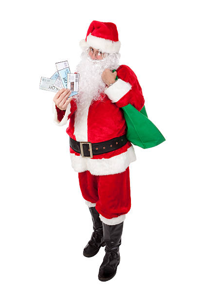 istock Santa Holding Coupons And Shopping Bag 472056473