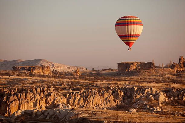 istock Hot air baloon at sunrise over Cappadocia Turkey 472057887