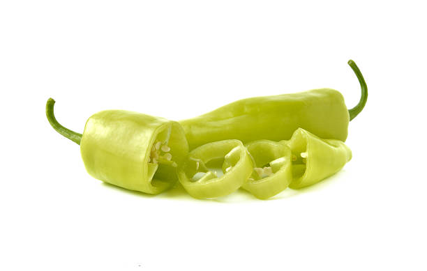 istock green chili peppers with stem on white background 472057934