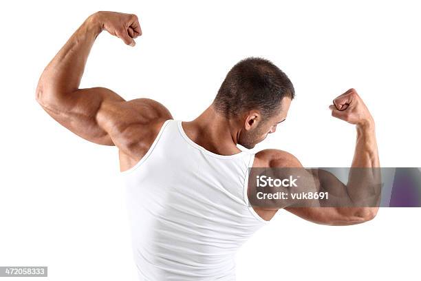 Big Pistolas Foto de stock y más banco de imágenes de Macho - Macho, Grande, Camiseta de tirantes