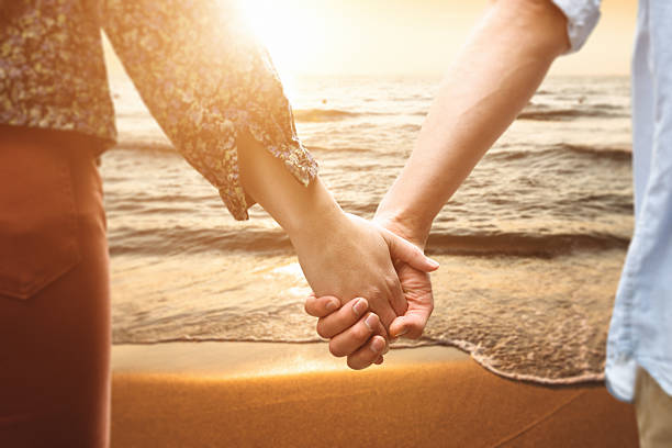 istock young couple watching the sunset on summer togetherness 472059341