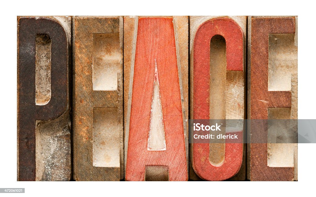 PEACE  Antique Letterpress Printing Blocks The word PEACE spelled out with vintage letterpress wood block letters. Alphabet Stock Photo